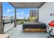 Spacious rooftop deck with a grill, outdoor furniture, pergola, and urban views at 907 Arlington N Ave, St Petersburg, FL 33705