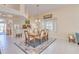 Dining area with natural light, neutral walls, and open concept living at 1129 Haley Ln, Dunedin, FL 34698