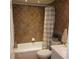 Bathroom with tub and shower, mosaic tile accent, and a white vanity at 113 Nina Way # 113, Oldsmar, FL 34677