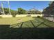 Expansive backyard with lush green grass, perfect for outdoor activities and relaxation at 11708 Nicklaus Cir, Tampa, FL 33624