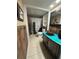 Rustic bathroom featuring unique vanity and flooring at 11708 Nicklaus Cir, Tampa, FL 33624