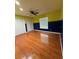 Spacious bedroom featuring hardwood floors, a ceiling fan and double closets at 11708 Nicklaus Cir, Tampa, FL 33624