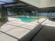 A screened-in pool for year-round enjoyment is the centerpiece of this home's outdoor living space at 11708 Nicklaus Cir, Tampa, FL 33624