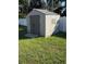 Outdoor storage shed in backyard providing convenience and organization at 11708 Nicklaus Cir, Tampa, FL 33624
