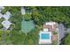 Aerial view showcasing the pool, tennis courts and common areas of a meticulously maintained community at 11868 Skylake Pl # 11767, Temple Terrace, FL 33617