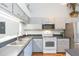 Bright and well-maintained kitchen featuring stainless steel appliances and ample counter space at 11868 Skylake Pl # 11767, Temple Terrace, FL 33617
