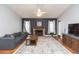 Inviting living room with wood flooring, fireplace and comfortable seating at 11868 Skylake Pl # 11767, Temple Terrace, FL 33617