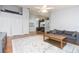 Open living room area with wood floors, neutral colors and comfortable seating at 11868 Skylake Pl # 11767, Temple Terrace, FL 33617