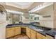 A spacious bathroom features double sinks, a vanity area, and a walk-in shower at 12302 Knight Pl, Thonotosassa, FL 33592