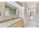 Bathroom featuring granite countertops, tile flooring and walk-in shower at 12302 Knight Pl, Thonotosassa, FL 33592