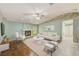 Elegant living room with fireplace, neutral decor, and comfortable seating arrangement at 12302 Knight Pl, Thonotosassa, FL 33592