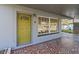 Close up of entryway featuring decorative tile, front door, and window at 1411 Barry St, Clearwater, FL 33756
