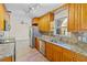 Well-equipped kitchen with stainless steel appliances and ample counter space at 1411 Barry St, Clearwater, FL 33756