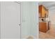 View of kitchen with granite countertops, wood cabinets and tile flooring at 1411 Barry St, Clearwater, FL 33756