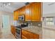 Stylish kitchen with granite countertops and stainless steel appliances at 1411 Barry St, Clearwater, FL 33756