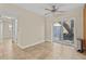 Bright living room featuring tile floors and sliding glass doors to the outside at 1411 Barry St, Clearwater, FL 33756