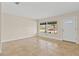 Bright living room featuring tile floors and a front door at 1411 Barry St, Clearwater, FL 33756