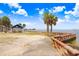Scenic beachfront with a cozy gazebo, bricked sidewalk, and serene water views, creating a peaceful retreat at 14616 Coral Dr, Hudson, FL 34667