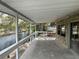 Expansive covered patio overlooking the canal, offering a serene outdoor living space at 14616 Coral Dr, Hudson, FL 34667