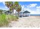 Beachfront pavilions offer shaded picnic spots and beautiful ocean views for relaxing by the water at 14616 Coral Dr, Hudson, FL 34667