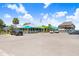 Spacious restaurant with ample parking, colorful awnings, and outdoor seating, perfect for dining by the waterfront at 14616 Coral Dr, Hudson, FL 34667