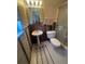 Bathroom with sink, toilet, shower, and exposed framework for renovation at 1850 Oklahoma Ne Ave, St Petersburg, FL 33703