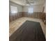 Bedroom featuring two windows, concrete flooring, and exposed framework for customization at 1850 Oklahoma Ne Ave, St Petersburg, FL 33703
