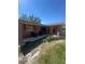 Charming brick single Gathering home with covered porch, inviting curb appeal, and mature landscaping at 1850 Oklahoma Ne Ave, St Petersburg, FL 33703