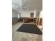 Living room with open layout, concrete flooring, and exposed framework for customization at 1850 Oklahoma Ne Ave, St Petersburg, FL 33703