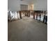 Open-concept living room awaiting renovation and flooded with natural light at 1850 Oklahoma Ne Ave, St Petersburg, FL 33703