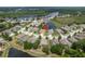 Lovely single-Gathering home surrounded by lush landscaping, ponds and mature trees in a serene residential neighborhood at 19123 Sunset Bay Dr, Land O Lakes, FL 34638