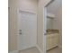Powder room featuring granite countertop and ample storage space beneath at 19123 Sunset Bay Dr, Land O Lakes, FL 34638