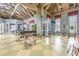 Modern gym with a variety of workout equipment, including free weights, machines, and ample space for exercise at 19123 Sunset Bay Dr, Land O Lakes, FL 34638