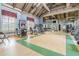 Bright, well-equipped gym with modern exercise machines and ample space for a complete workout at 19123 Sunset Bay Dr, Land O Lakes, FL 34638