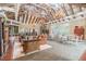 Spacious lobby offering seating areas, dining tables, and a game table, perfect for socializing and community events at 19123 Sunset Bay Dr, Land O Lakes, FL 34638