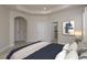 This bedroom features an ensuite bathroom, plenty of space, and is tastefully decorated at 19123 Sunset Bay Dr, Land O Lakes, FL 34638