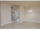 Open room with stairs, tile flooring, recessed lighting, and a chandelier for a modern touch at 19123 Sunset Bay Dr, Land O Lakes, FL 34638