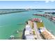 Waterfront complex with boat docks and nearby island communities at 200 Brightwater Dr # 10, Clearwater Beach, FL 33767