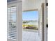 Balcony view overlooking the serene waterfront and boat docks at 200 Brightwater Dr # 10, Clearwater Beach, FL 33767