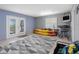Finished bonus room with a door to the outside, recreational equipment, and a coastal aesthetic at 200 Brightwater Dr # 10, Clearwater Beach, FL 33767