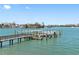 Waterfront property featuring a private dock for boating and enjoying the water at 200 Brightwater Dr # 10, Clearwater Beach, FL 33767