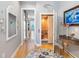 Well-lit hallway with elevator access and decorative elements at 200 Brightwater Dr # 10, Clearwater Beach, FL 33767
