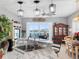 Kitchen island sink overlooking the living area and the outside water view at 200 Brightwater Dr # 10, Clearwater Beach, FL 33767