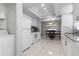 Open kitchen area with appliances, eating area and tile flooring at 217 Regal Park Dr, Valrico, FL 33594