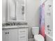 This bathroom features a vanity with marble counters, a toilet, and a shower/tub combo at 2316 S Thixton Ct, Tampa, FL 33629