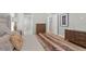 This bedroom has wood floors and a chest of drawers at 2316 S Thixton Ct, Tampa, FL 33629
