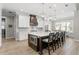 Spacious kitchen with a large island, pendant lights, stainless appliances and seating at 2316 S Thixton Ct, Tampa, FL 33629
