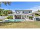 Beautiful backyard featuring a pool, outdoor kitchen and covered lounge area at 2316 S Thixton Ct, Tampa, FL 33629