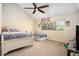 A bright bedroom with a window and two beds, creating a cozy and functional space at 2599 Dolly Bay Dr # 209, Palm Harbor, FL 34684