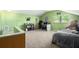 Bonus room with cozy furniture and a window with natural light, creating a versatile living space at 2599 Dolly Bay Dr # 209, Palm Harbor, FL 34684